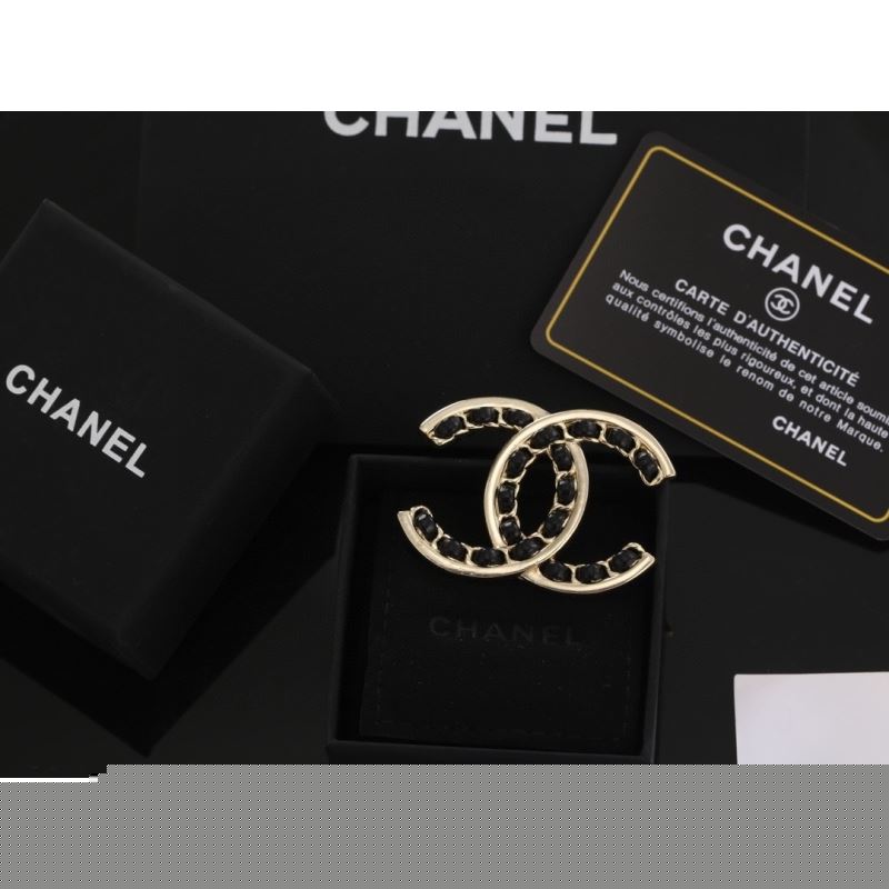 Ch*el brooches